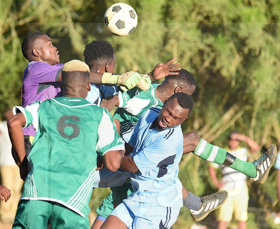 Young footballers competing at a community tournament